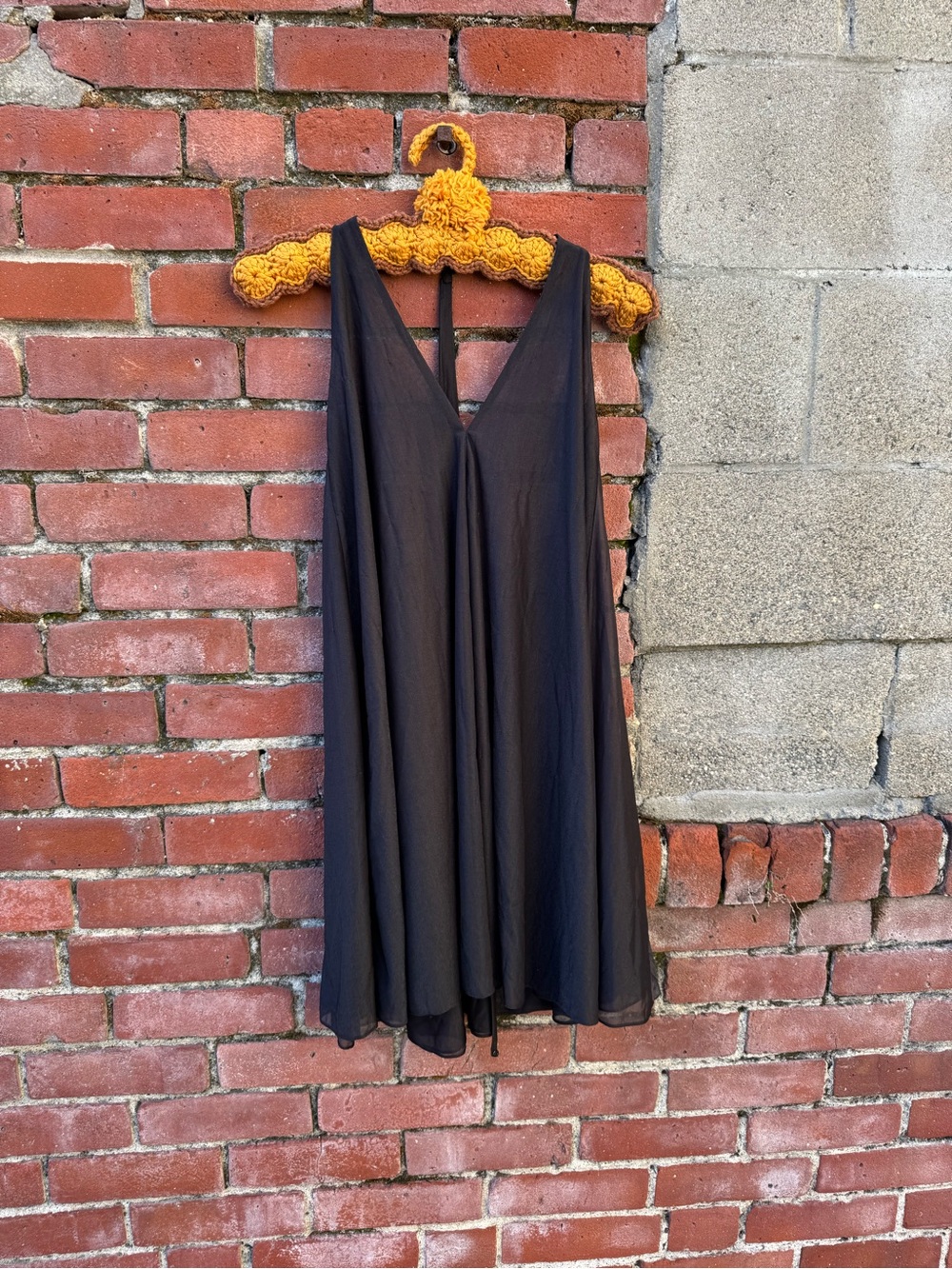Barney’s New York black open back mini dress